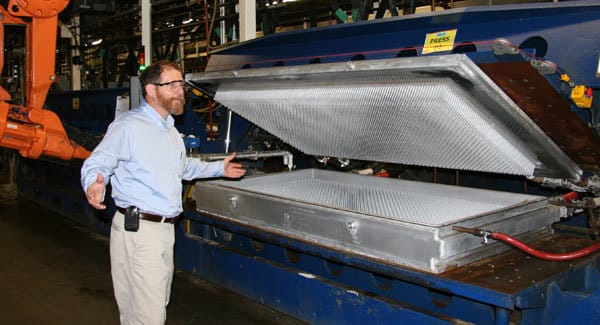 LI-DaveTakesTurn Dave inspects Talalay latex core in production