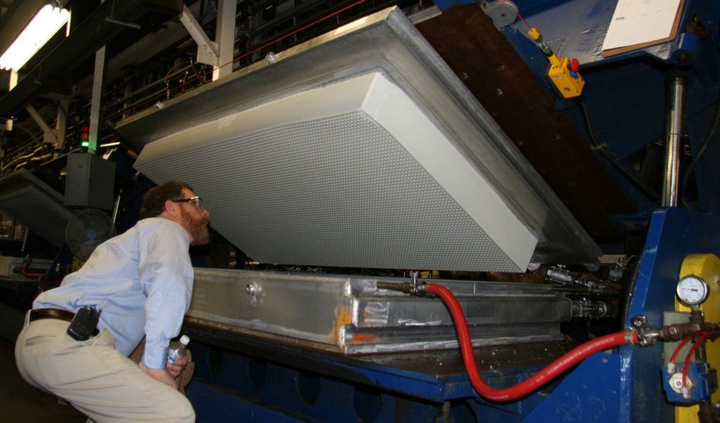 DaveInspectsLITalalay Dave inspects Talalay Latex Core coming out of mold